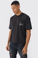 camiseta oversize recta con estampado de flores en relieve negro