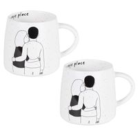 taza de ceramica blanca y negra con motivo de pareja