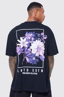 camiseta oversize con estampado grafico de flores en la espalda negro