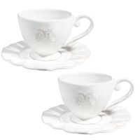 taza y platillo de cafe de loza blanca