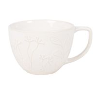 taza y platillo de ceramica grabada blanca