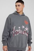 sudadera oversize destenida con capucha y estampado grafico homme en relieve gris