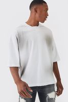 top oversize premium destenido con escote de pico y caida en los hombros blanco