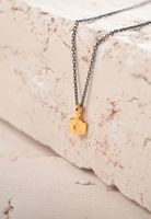 close heart gold necklace