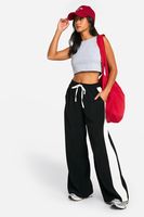 pantalon petite de pernera ancha y tela crepe con rayas en contraste negro