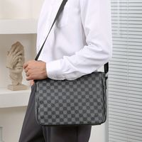 bolso de mensajero a cuadros informales para hombres ligero y perfecto para viajar y trabajar