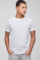 camiseta man de tela gofre con ribetes en los filos y bordado gris