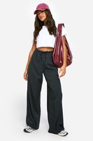 pantalon de pernera ancha con rayas negro