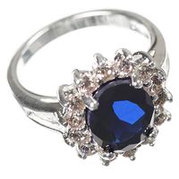 silver plated ring with blue sapphire stone effect centre  - in the style of kate middleton - n