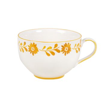 Taza de cerámica blanca de flores amarillo