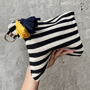 Bolso de mano de lona a rayas coloridas, bolso cosmético decorado con borlas estéticas, estuche de almacenamiento para viajar, salir